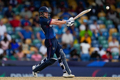 Bernard Scholtz plays a shot against Scotland
